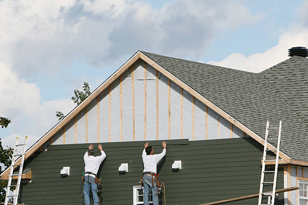 Professional Storm Damage Siding Repair technician working in Callaway, FL